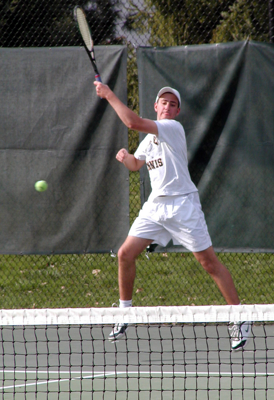 Southpaw Angelo Coclanis '05 drives a forehand.