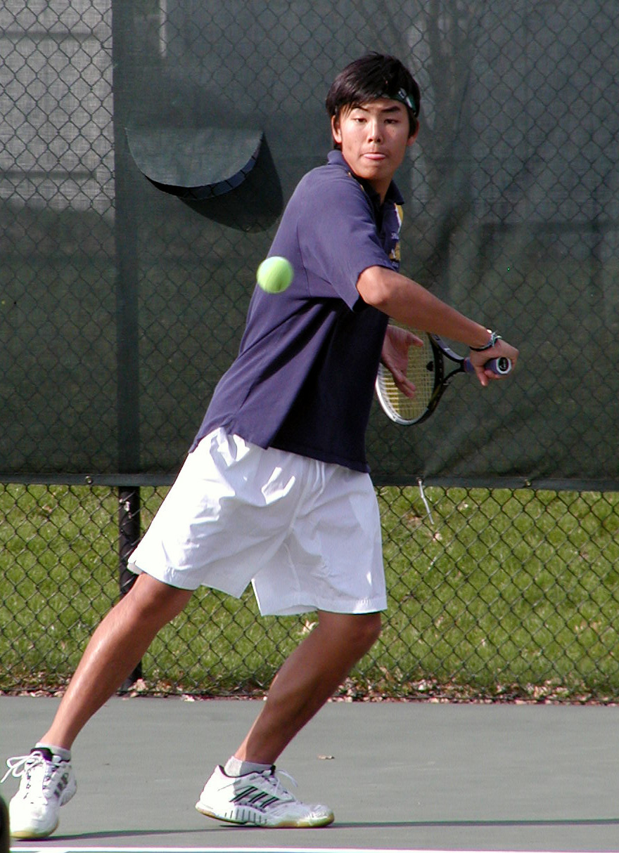 Ming Ong '05 preps a backhand.