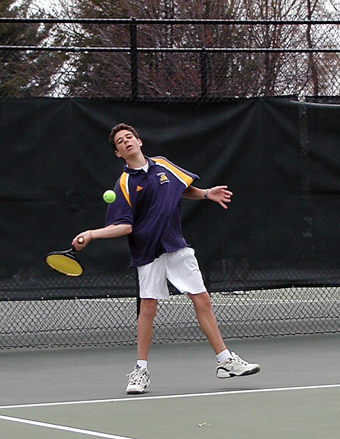 Fifth former Mauricio Osorio about to whip a forehand.