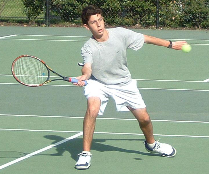 Jeff Berry '06 volleys.